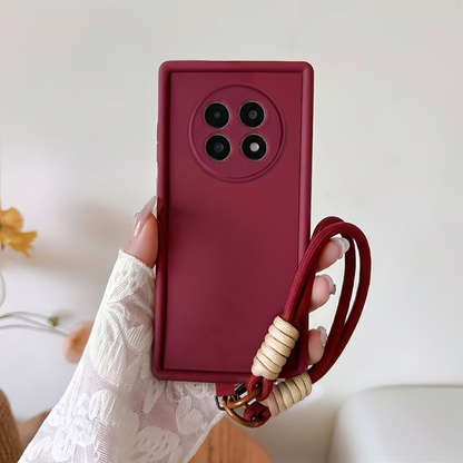 Oppo F31 Pro Plus 5G Red phone case with a strap held by a hand against a light background