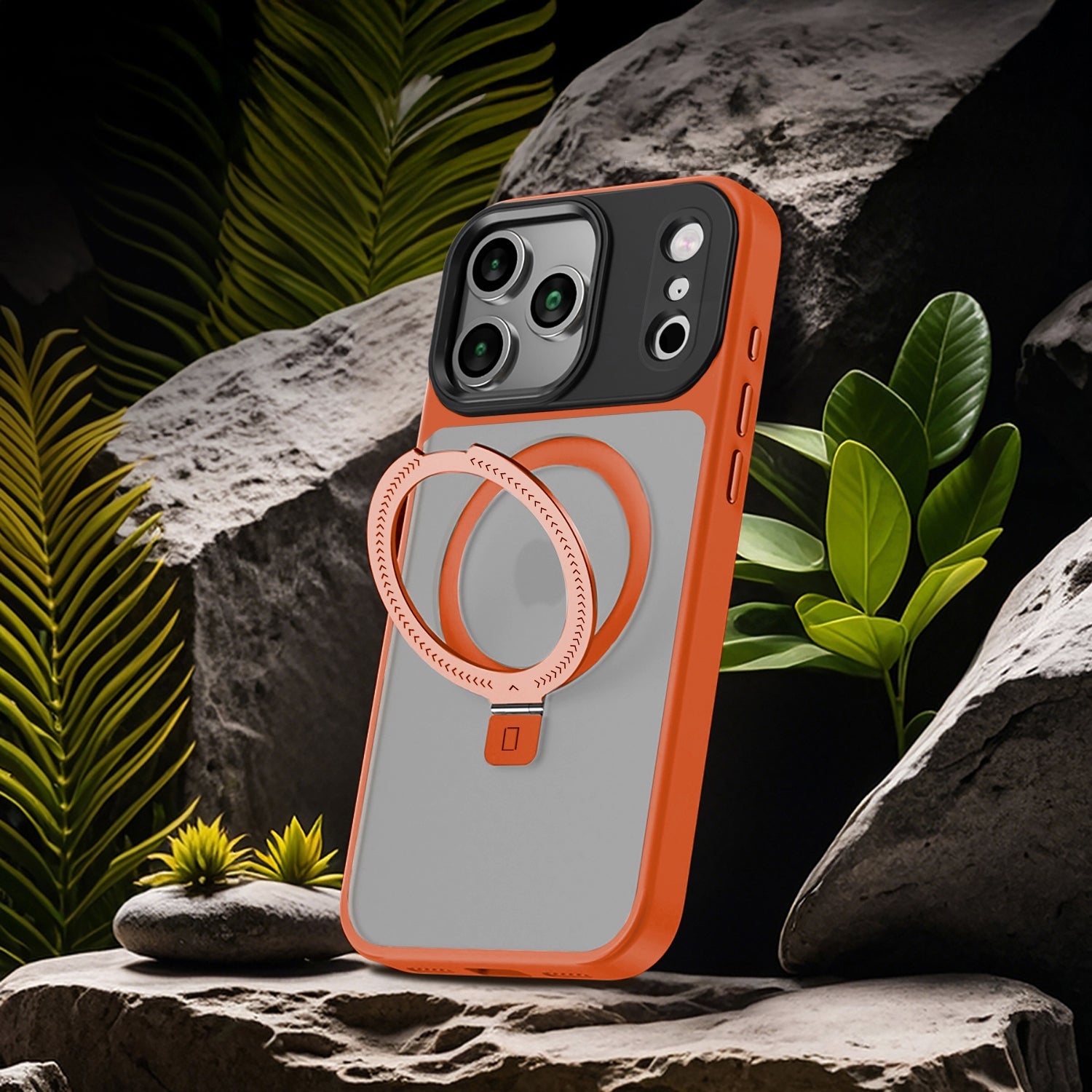 Phone case with ring holder on a rock with plants