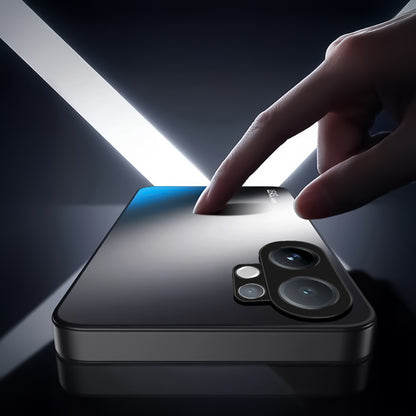 Vivo V60 5G Hand touching a black smartphone with a reflective surface cover