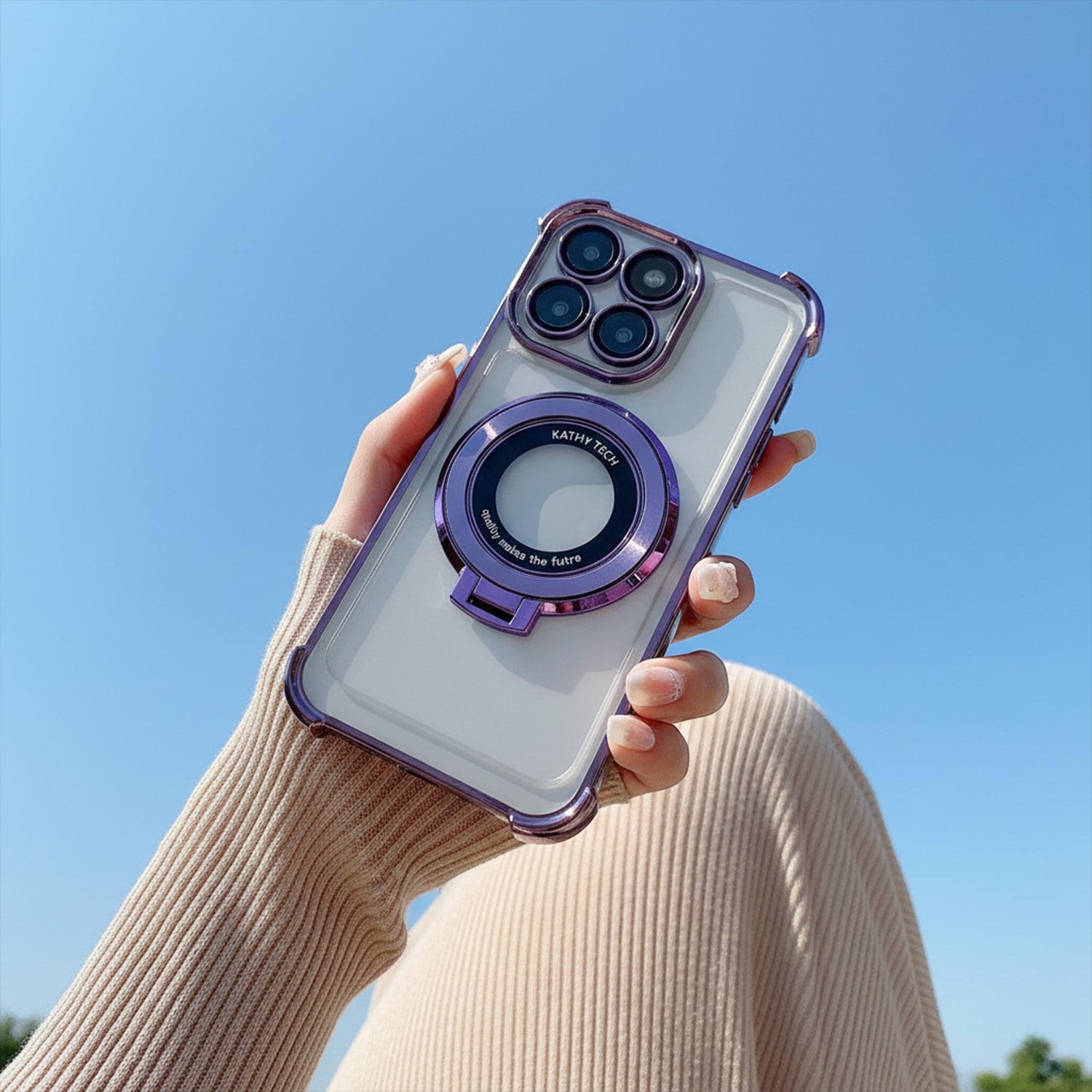 Hand holding a Motorola Edge 60 Pro 5G phone with a purple case against a clear blue sky