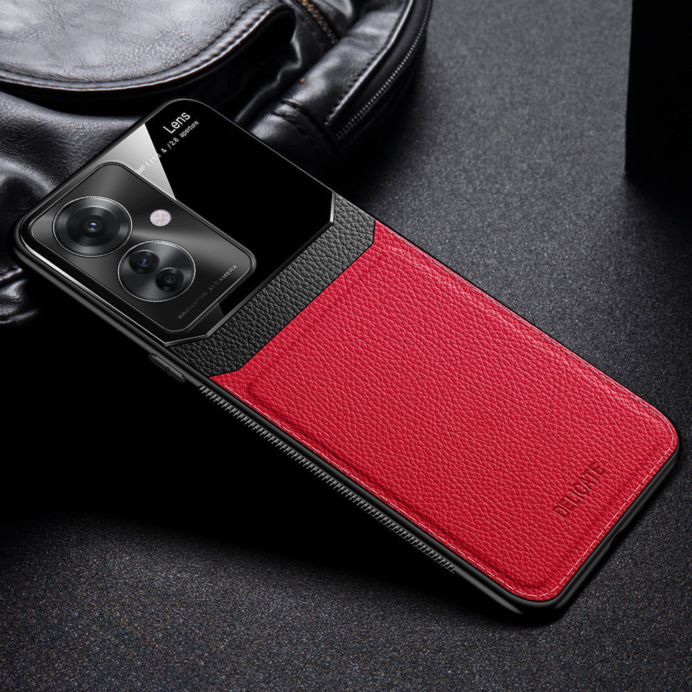 A red and black Oppo F25 Pro 5G Premium Leather Lens Protective Case for a smartphone, displayed on a surface with a leather bag in the background.
