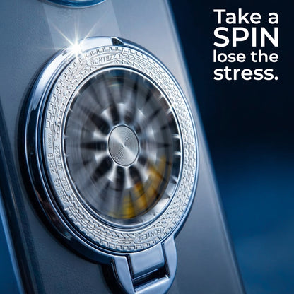 Close-up of a metallic object with text 'Take a SPIN lose the stress.'