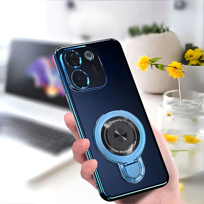 Smartphone with a blue magnetic ring holder held by a hand, blurred indoor background