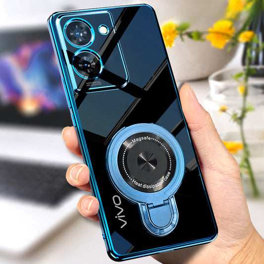 Smartphone with blue case and ring holder held by a hand, blurred indoor background