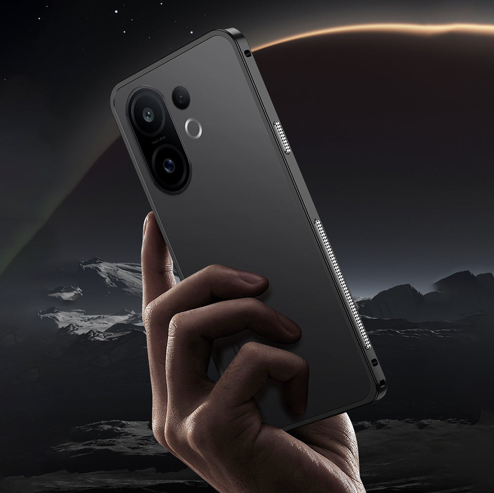 Vivo X200 FE 5G Hand holding a black smartphone with a mountainous landscape in the background