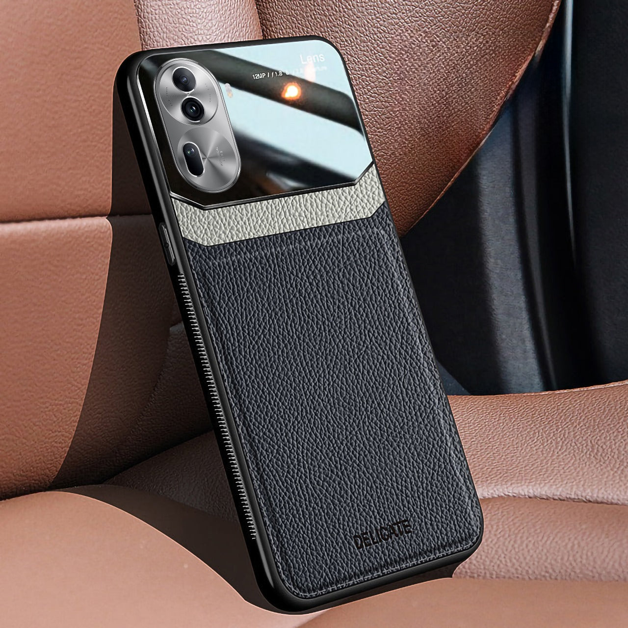 A black Oppo Reno 11 Pro 5G smartphone in a premium leather protective case with a matte finish, displayed on a car seat.