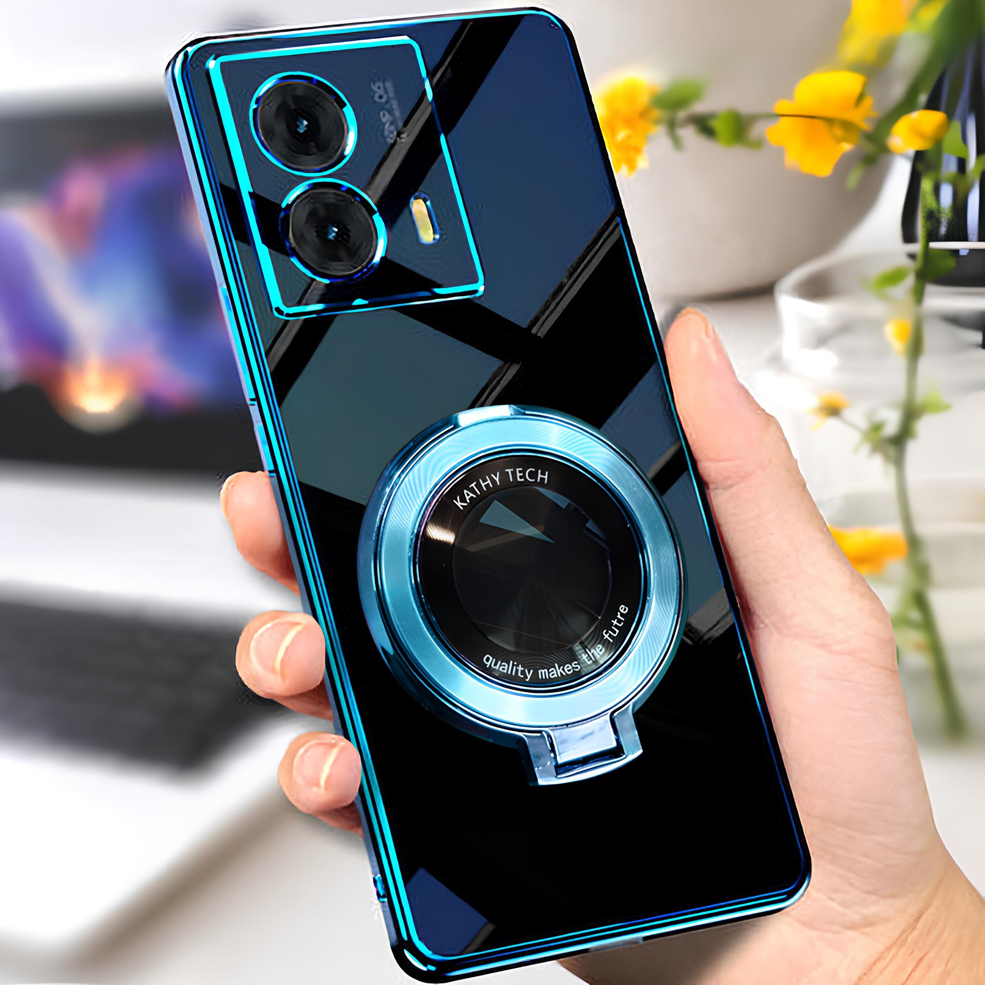 Smartphone with a blue ring light attachment held by a hand, blurred indoor background