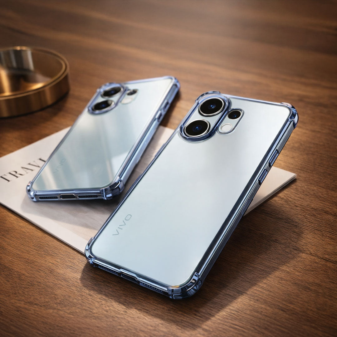 Two Vivo V60 5G smartphones with clear protective cases on a wooden surface