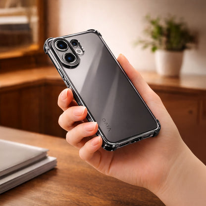 Hand holding a Vivo V60 5G smartphone with a transparent case on a wooden surface.