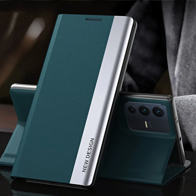 A green magnetic flip leather case for the Vivo V23 5G smartphone, displayed on a table with a blurred background.